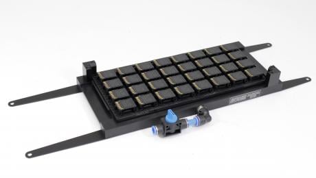 Vacuum clamping fixture for testing SD cards