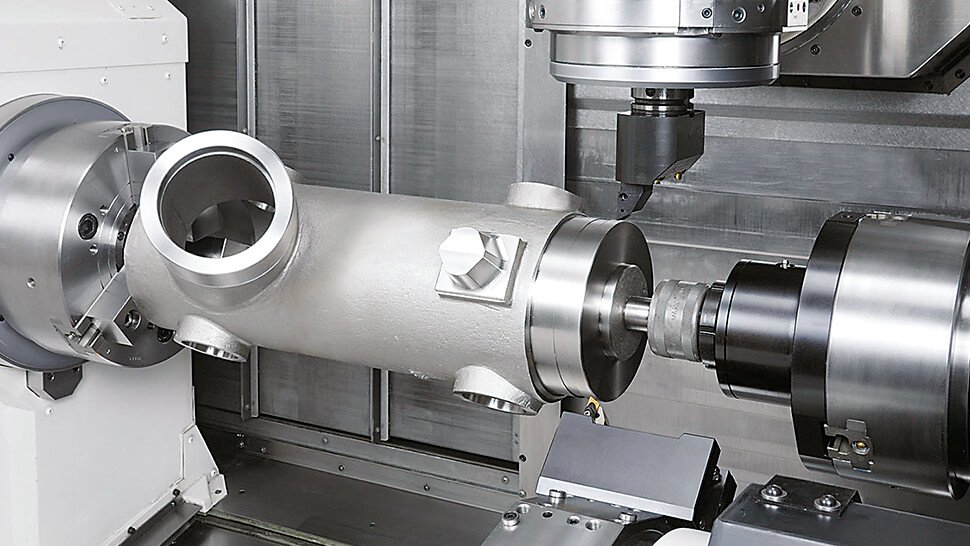 The lower turret is often used for simultaneous machining, as in this example, but can also be used as a steady rest to support long workpieces.  Image courtesy of Okuma America