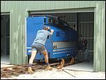 7. Rolling Lathe Into Shed.JPG
